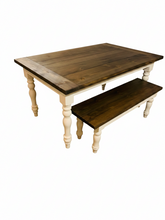 Load image into Gallery viewer, White-background product view of farmhouse dining table and bench with dark walnut plank tops and cream turned legs