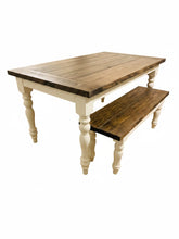 Load image into Gallery viewer, Angled studio view of dark walnut farmhouse table with matching turned-leg bench and white painted table apron
