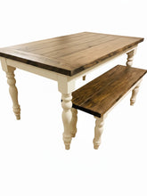 Load image into Gallery viewer, Side-angle studio view of dark stained farmhouse tabletop with breadboard edges, white turned legs and tucked-in bench
