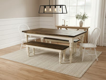 Load image into Gallery viewer, Farmhouse dining table with dark walnut top and two benches, styled with white chairs in a light dining room
